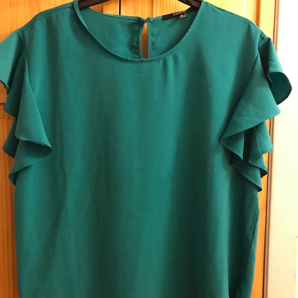Brand new woman's blouse size medium
